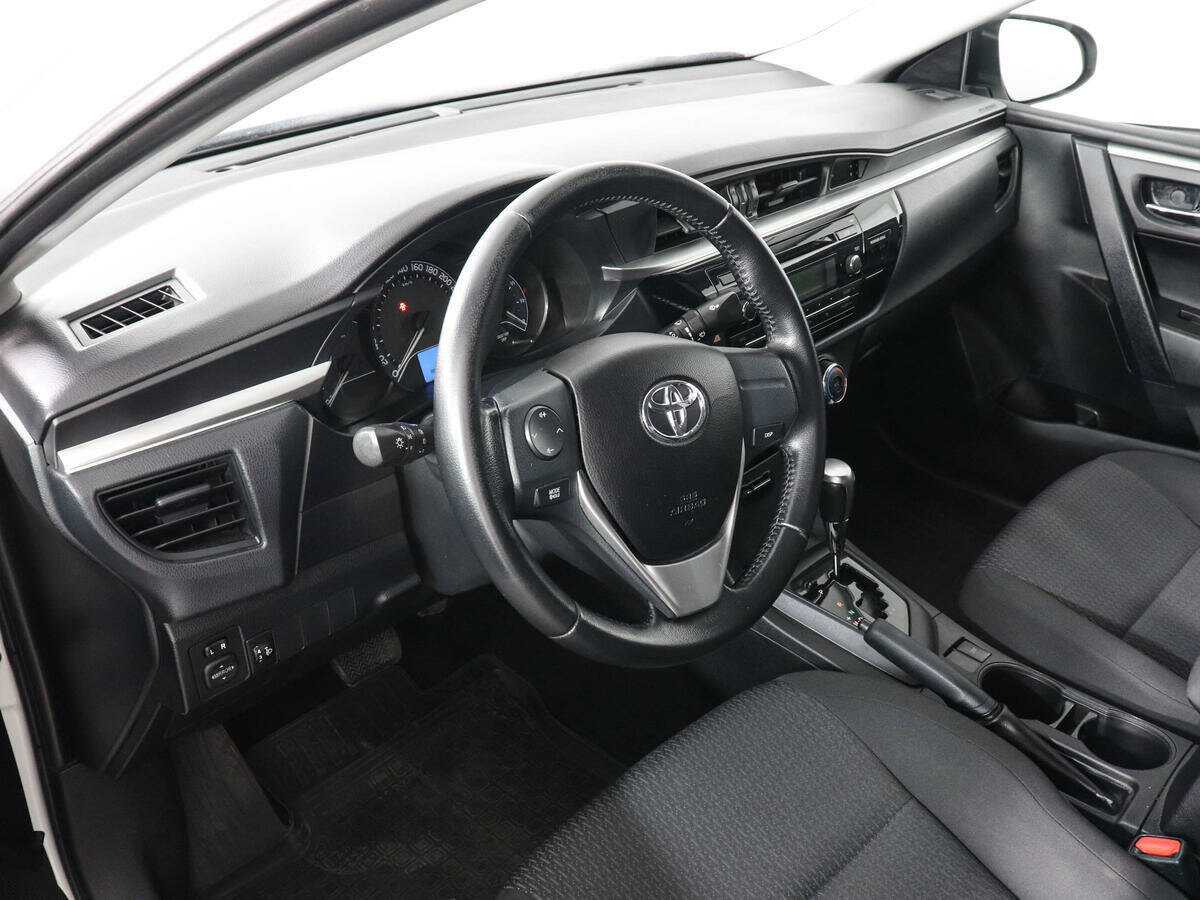 Toyota Corolla с пробегом — 2014 год. Фото: #8