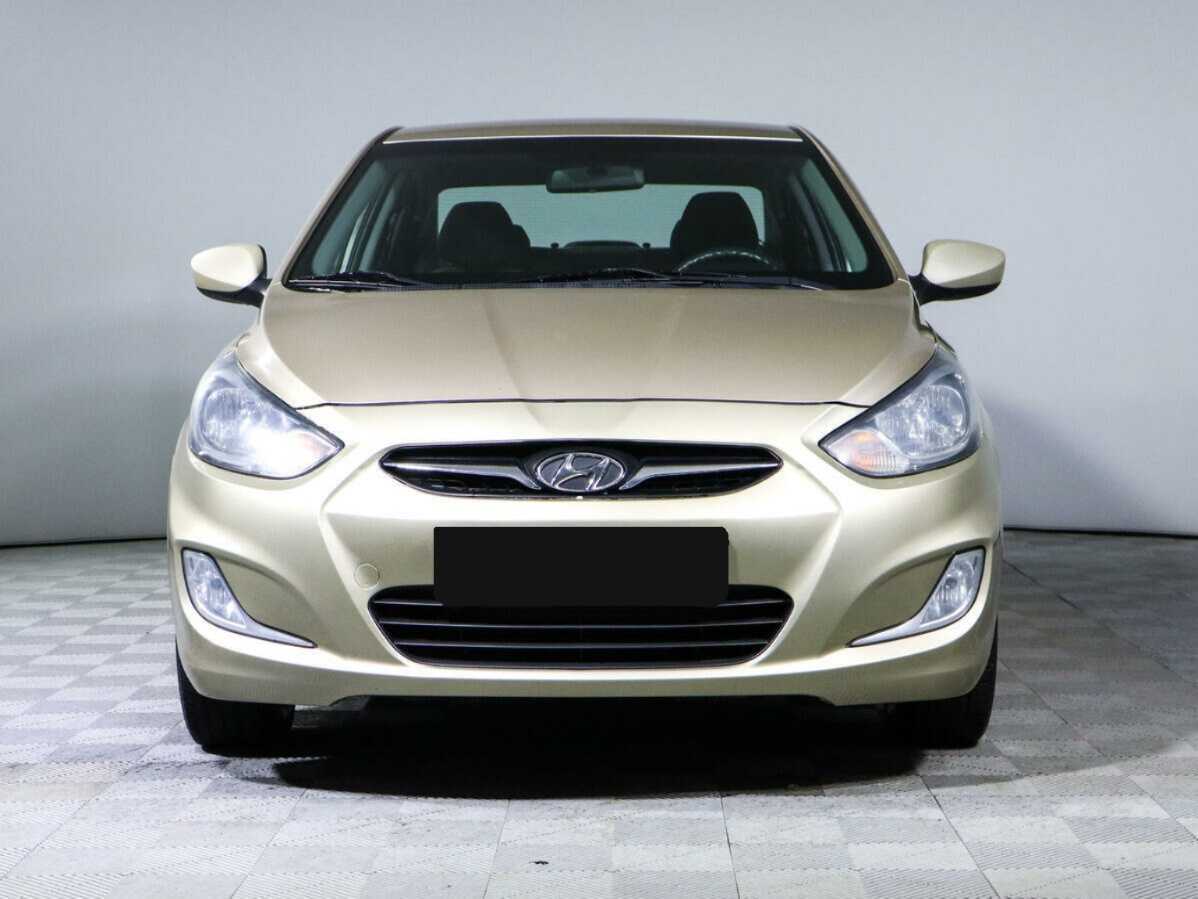 Hyundai Solaris с пробегом — 2013 год. Фото: #1