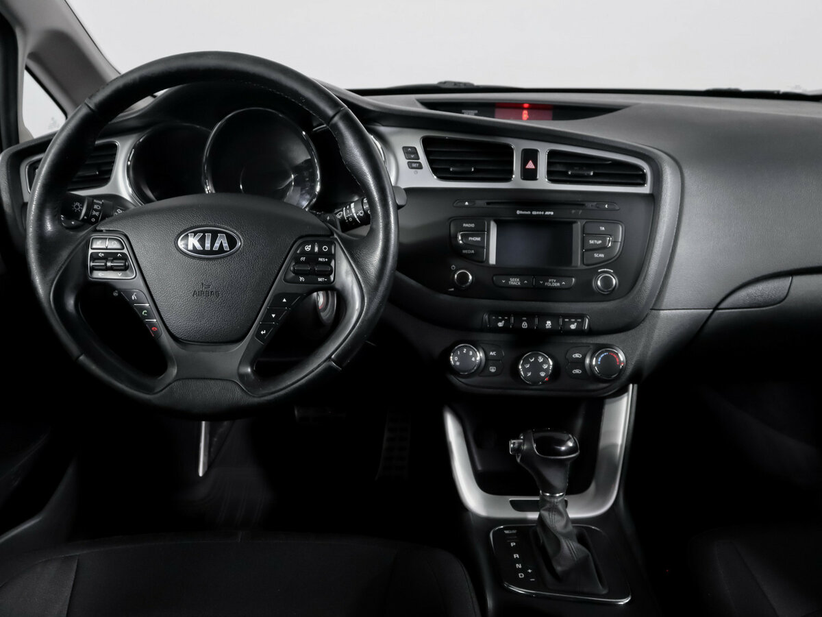 Kia Ceed с пробегом — 2014 год. Фото: #9