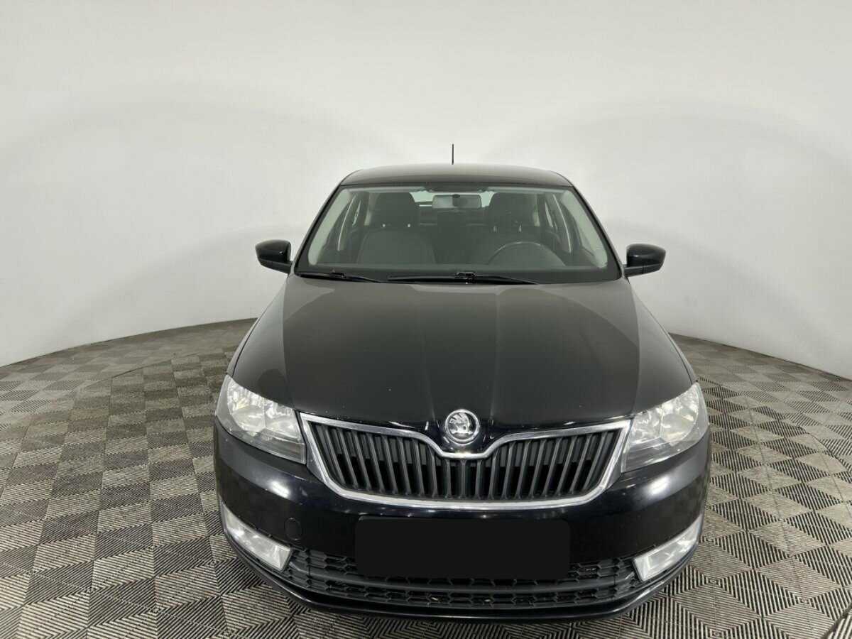 Skoda Rapid с пробегом — 2014 год. Фото: #1