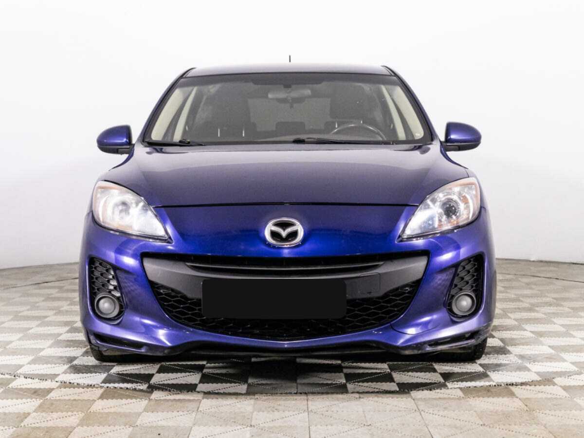 Mazda 3 с пробегом — 2012 год. Фото: #1