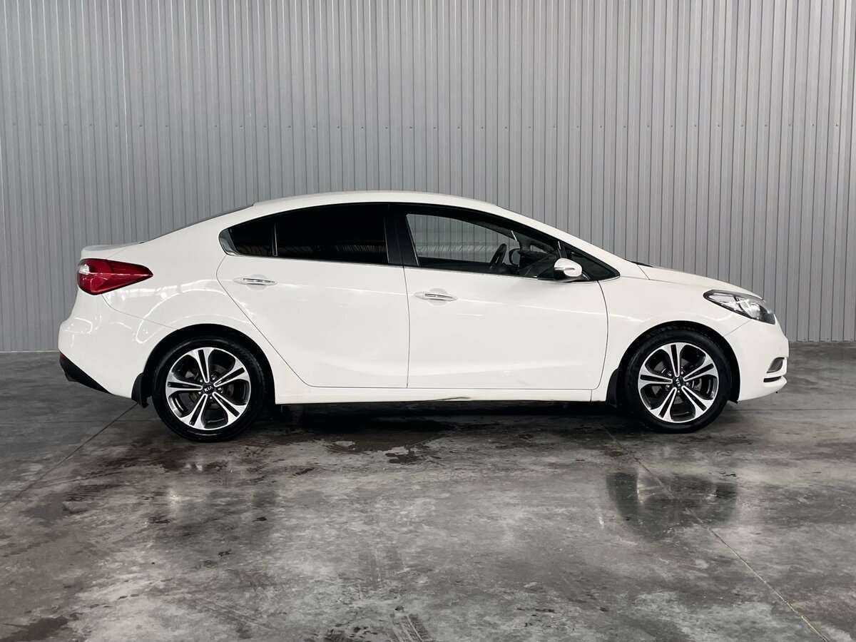 Kia Cerato с пробегом — 2014 год. Фото: #3
