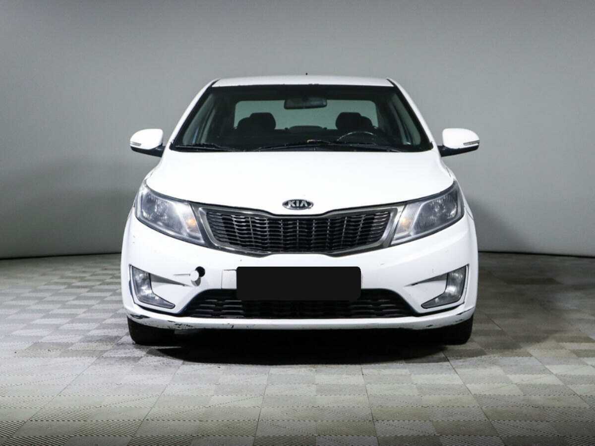 Kia Rio с пробегом — 2014 год. Фото: #1