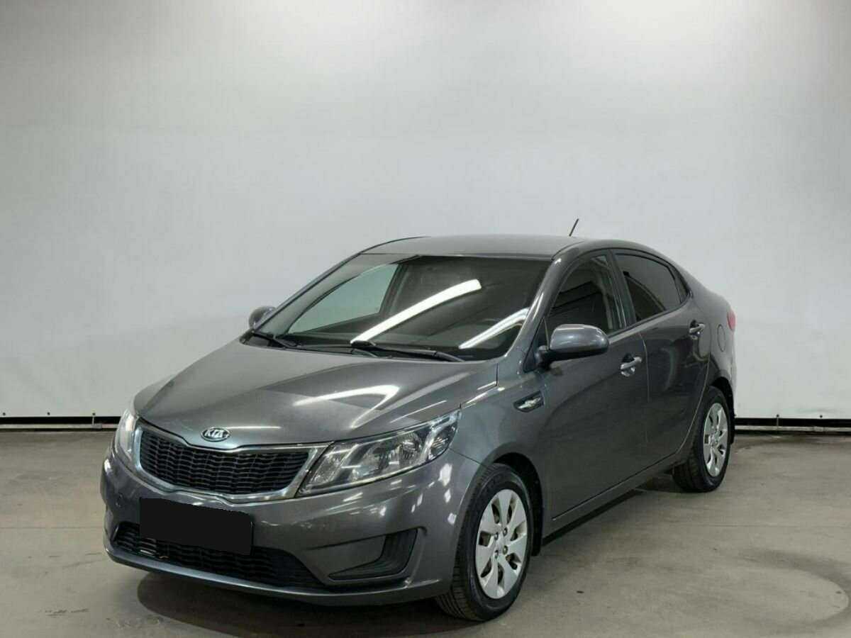 Kia Rio с пробегом — 2014 год. Фото: #0