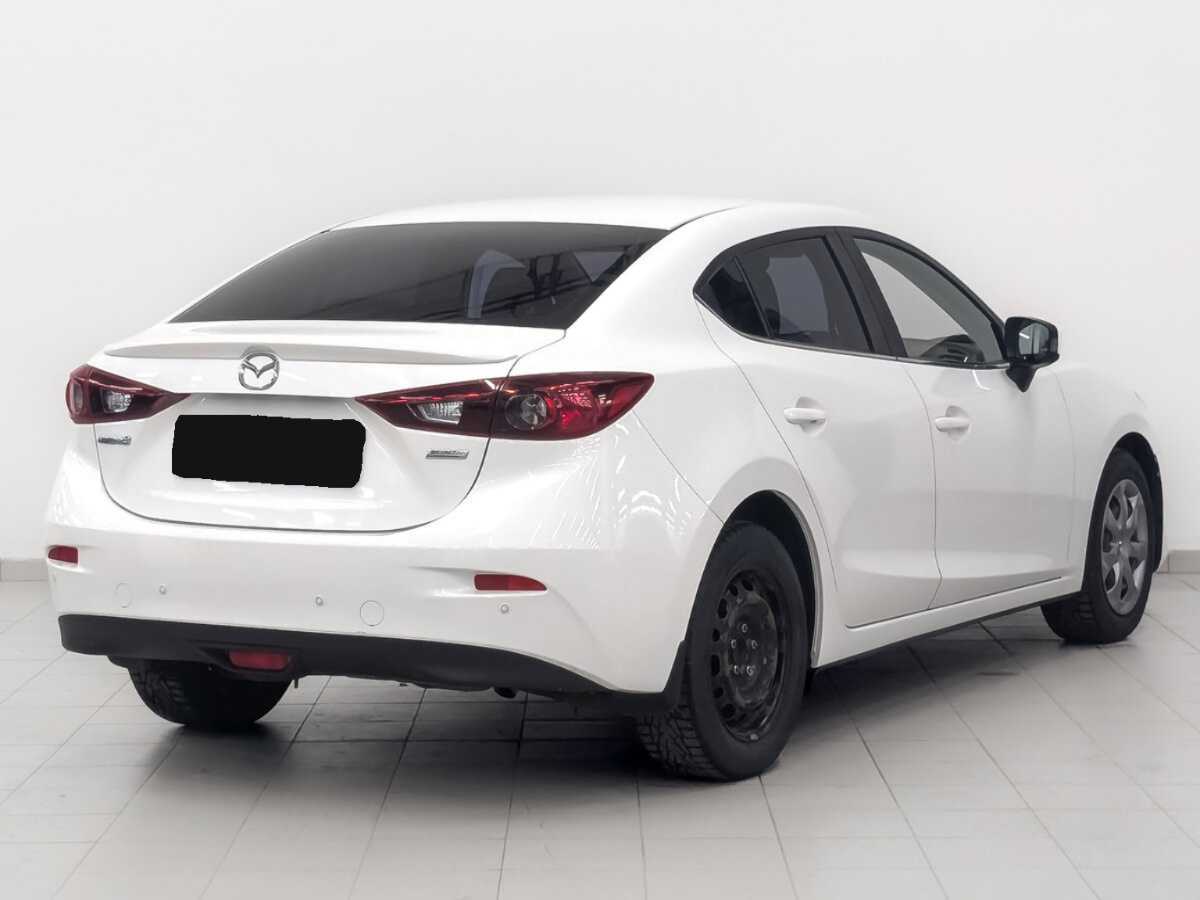 Mazda 3 с пробегом — 2014 год. Фото: #4