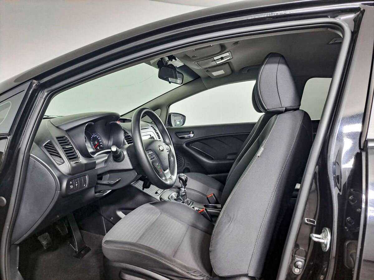 Kia Cerato с пробегом — 2014 год. Фото: #13