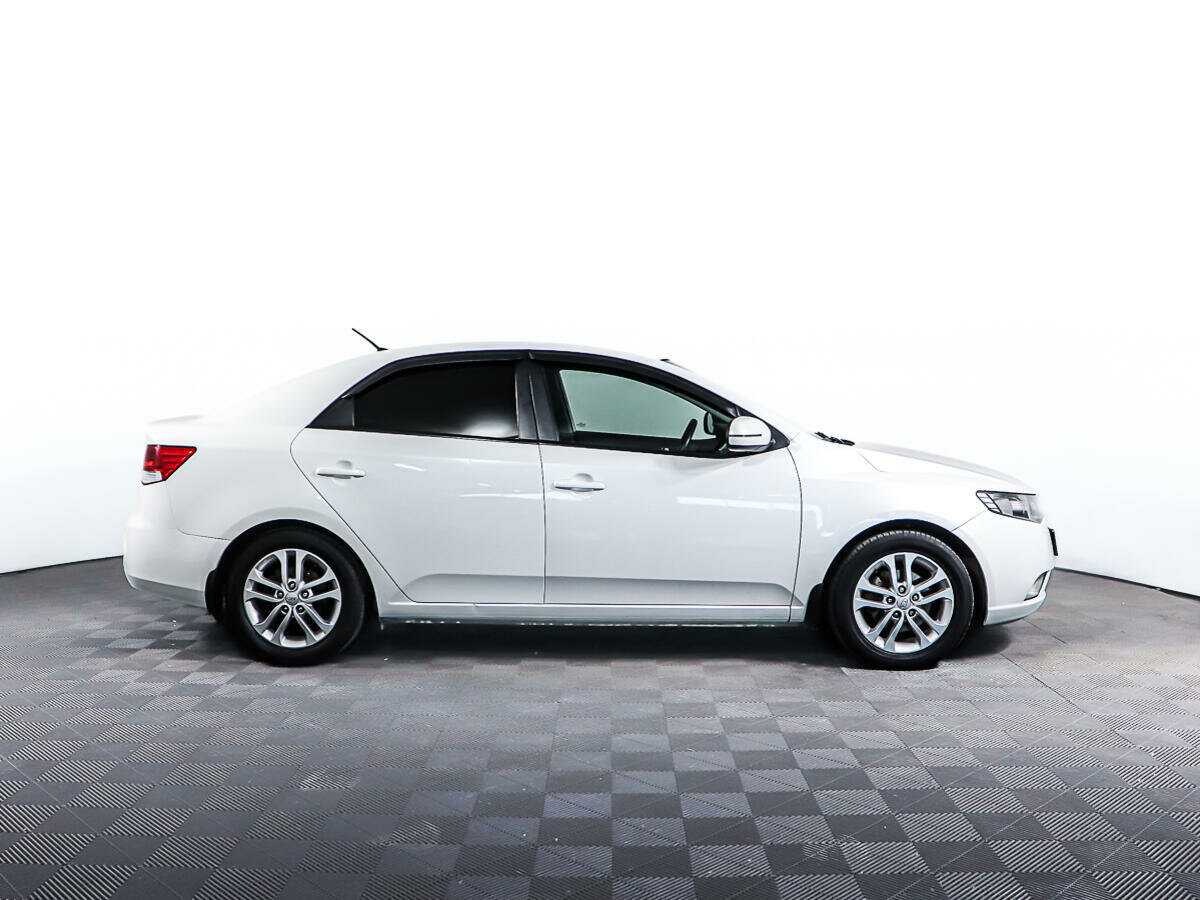 Kia Cerato с пробегом — 2012 год. Фото: #3