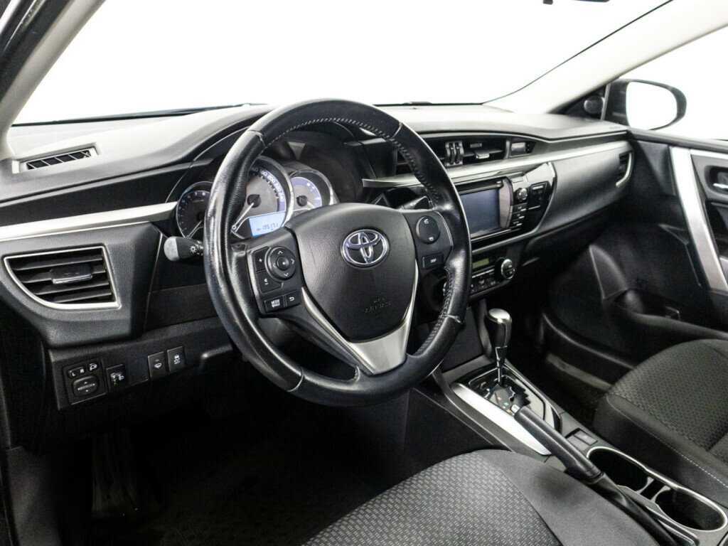Toyota Corolla с пробегом — 2014 год. Фото: #10
