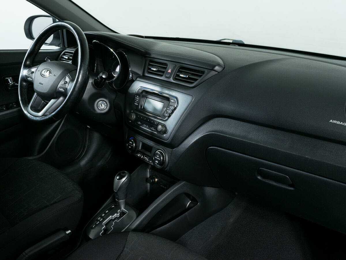 Kia Rio с пробегом — 2013 год. Фото: #7