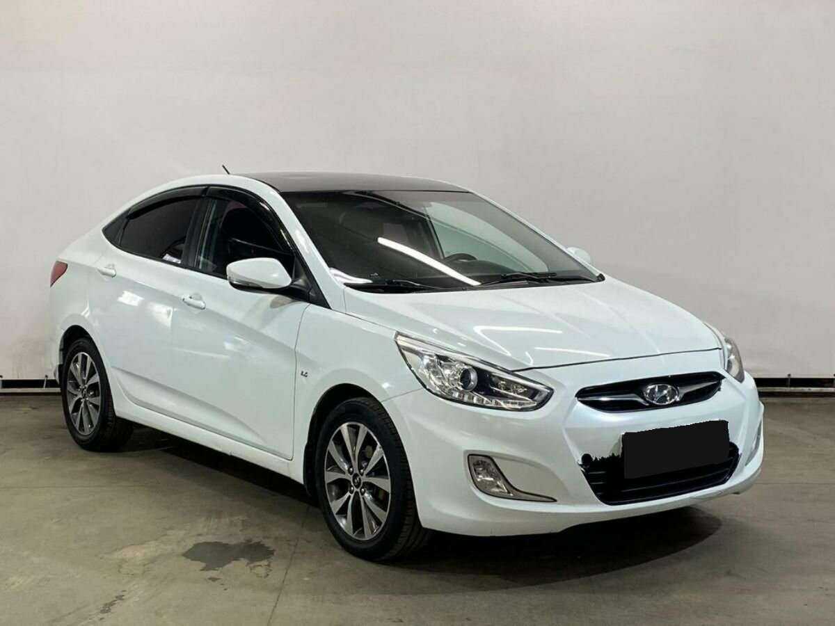 Hyundai Solaris с пробегом — 2013 год. Фото: #2