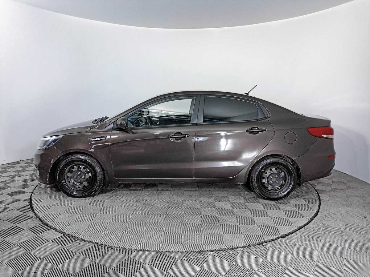 Kia Rio с пробегом — 2015 год. Фото: #7
