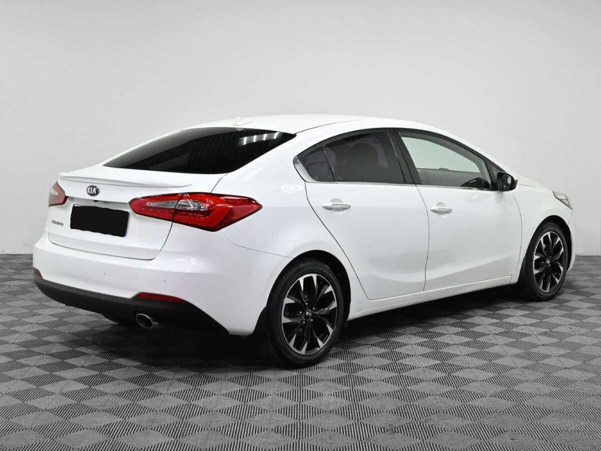 Kia Cerato с пробегом — 2015 год. Фото: #1