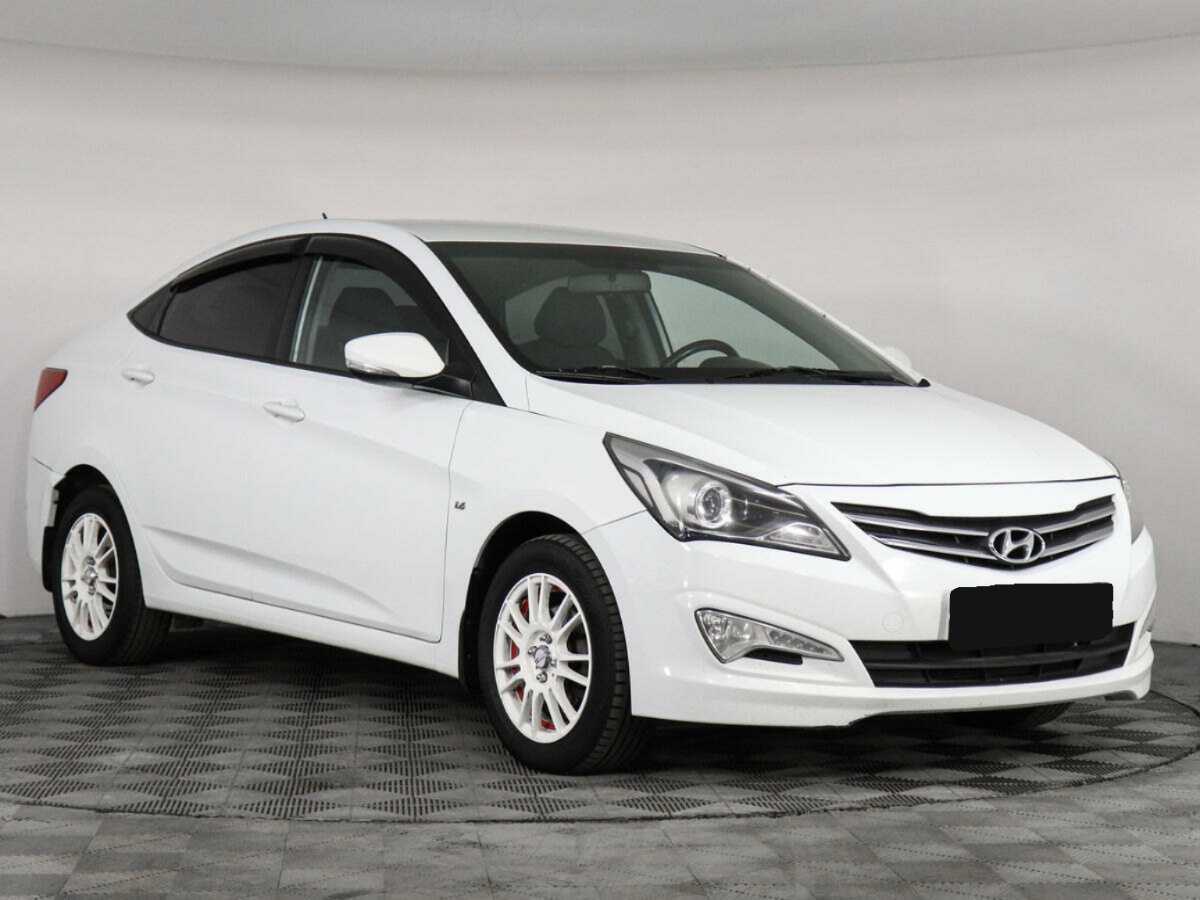 Hyundai Solaris с пробегом — 2014 год. Фото: #2