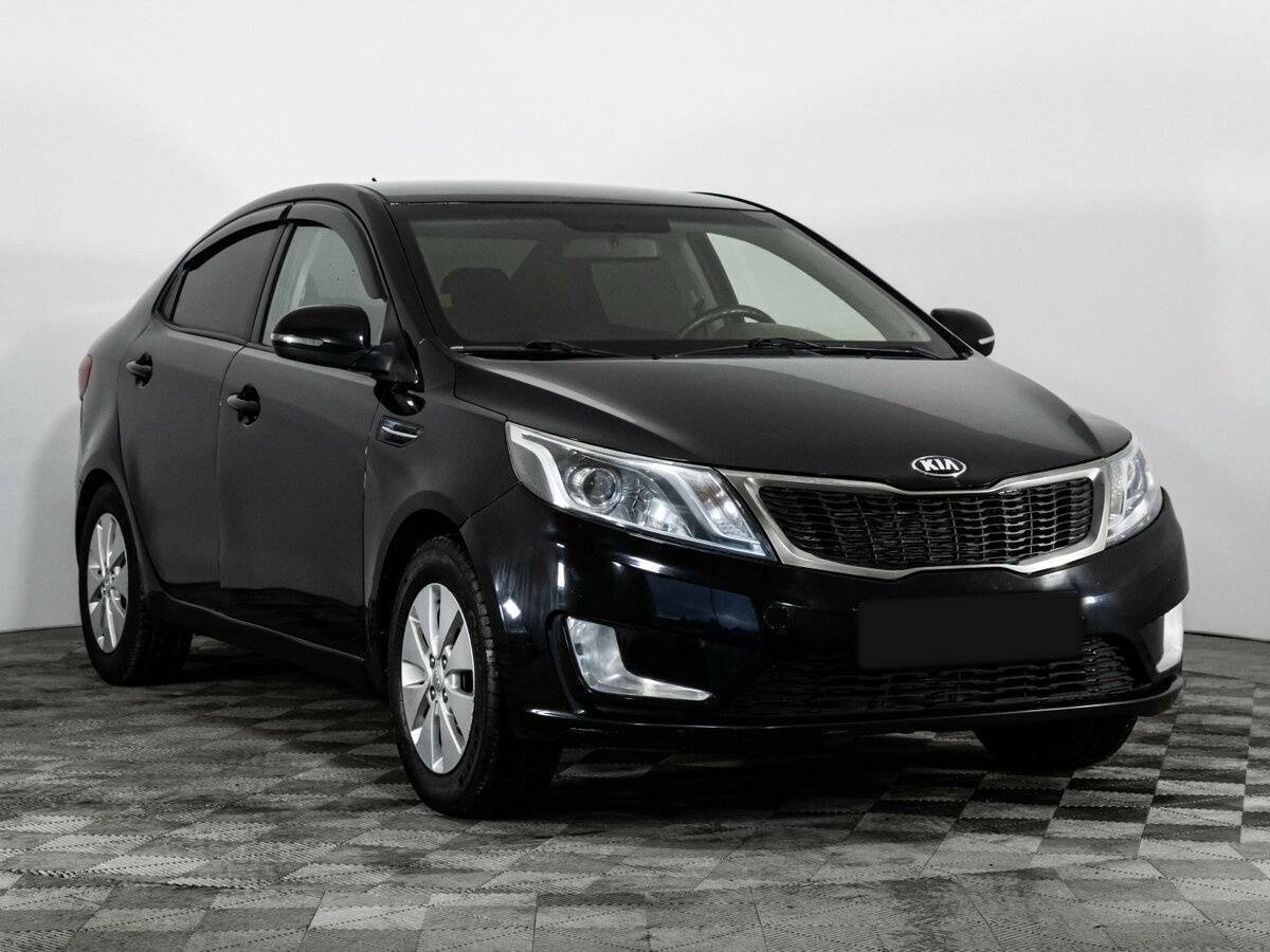 Kia Rio с пробегом — 2012 год. Фото: #2