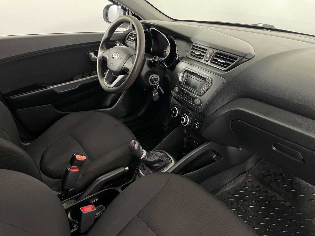 Kia Rio с пробегом — 2013 год. Фото: #10