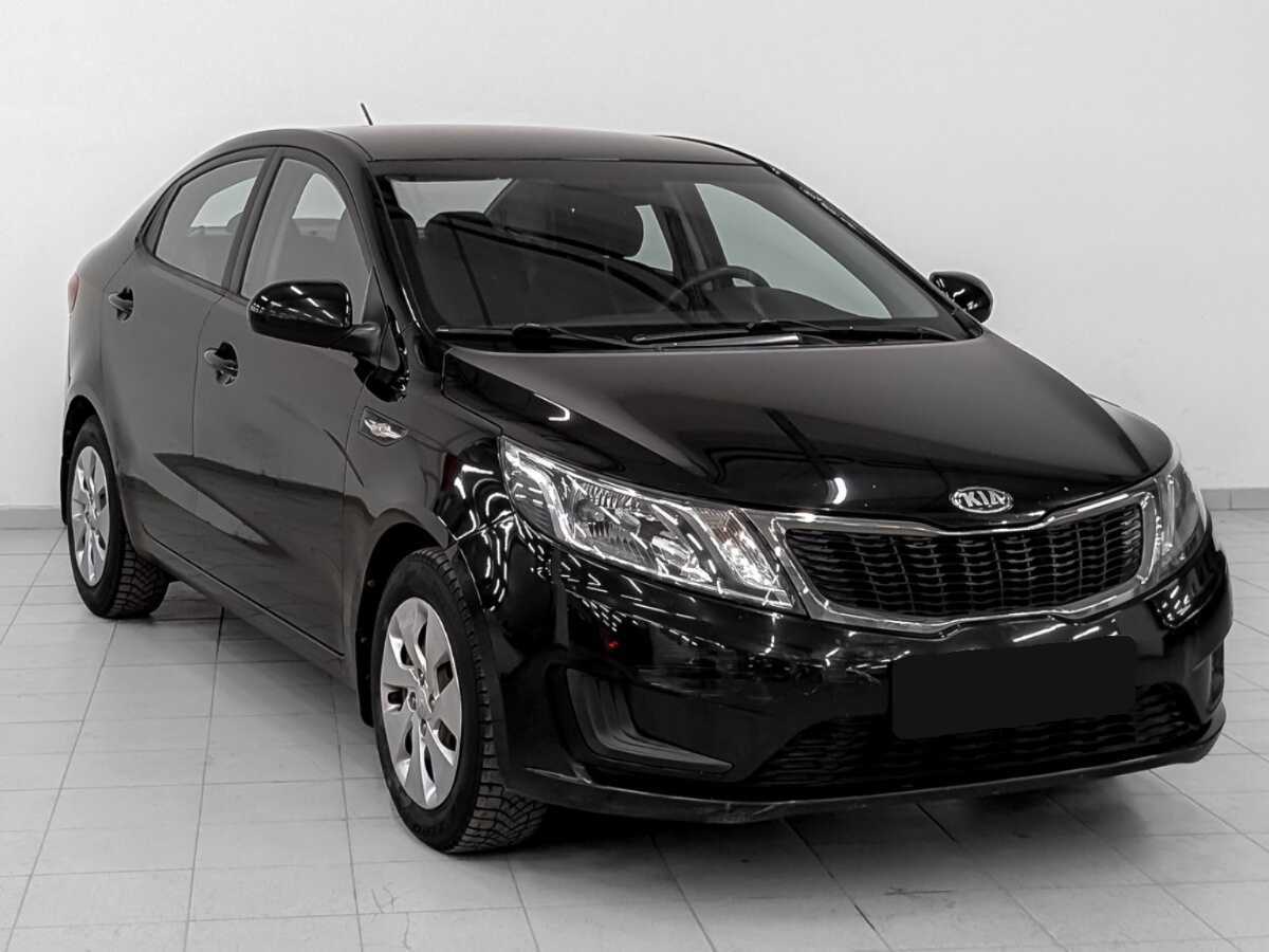 Kia Rio с пробегом — 2013 год. Фото: #2