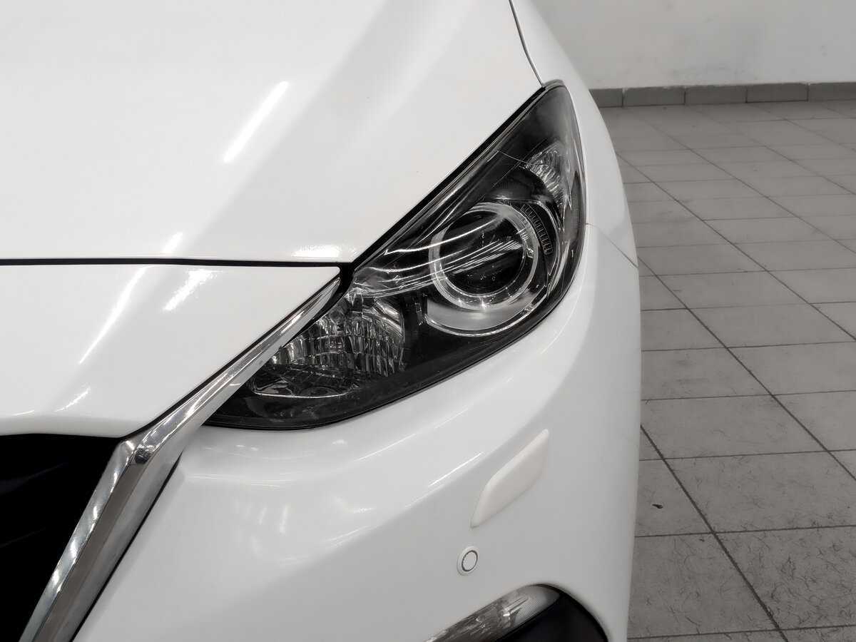 Mazda 3 с пробегом — 2014 год. Фото: #16