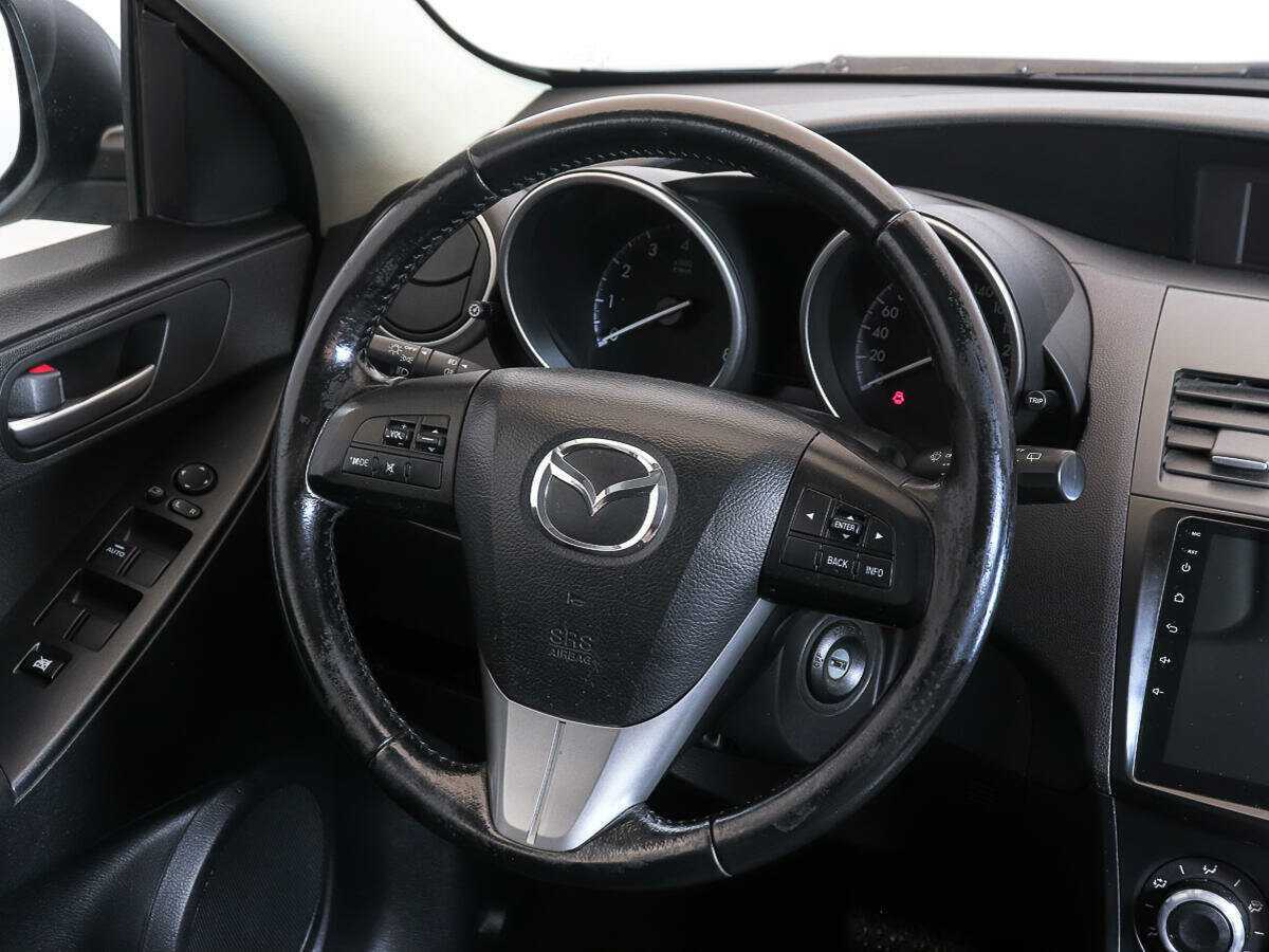Mazda 3 с пробегом — 2012 год. Фото: #12