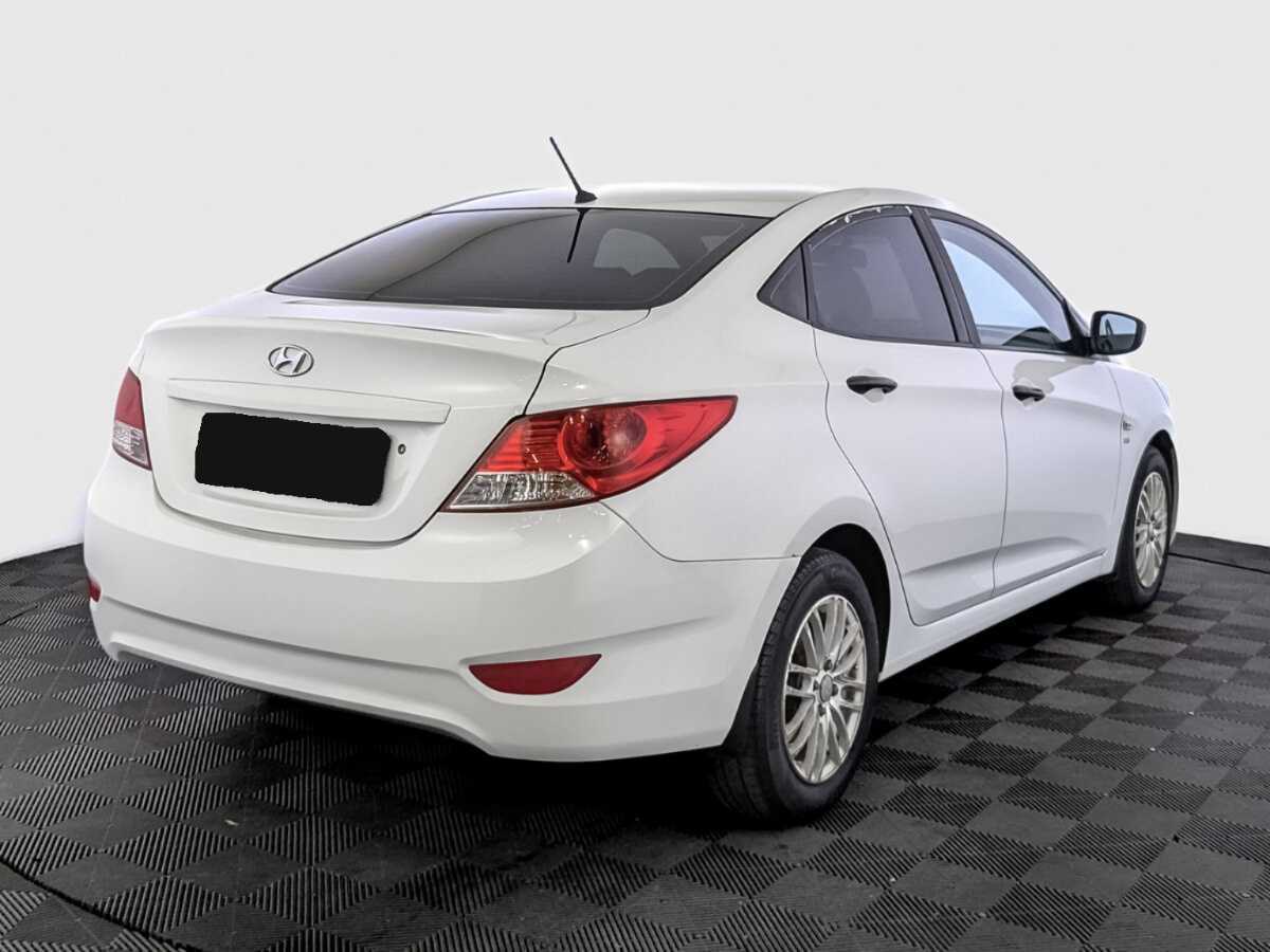 Hyundai Solaris с пробегом — 2014 год. Фото: #4
