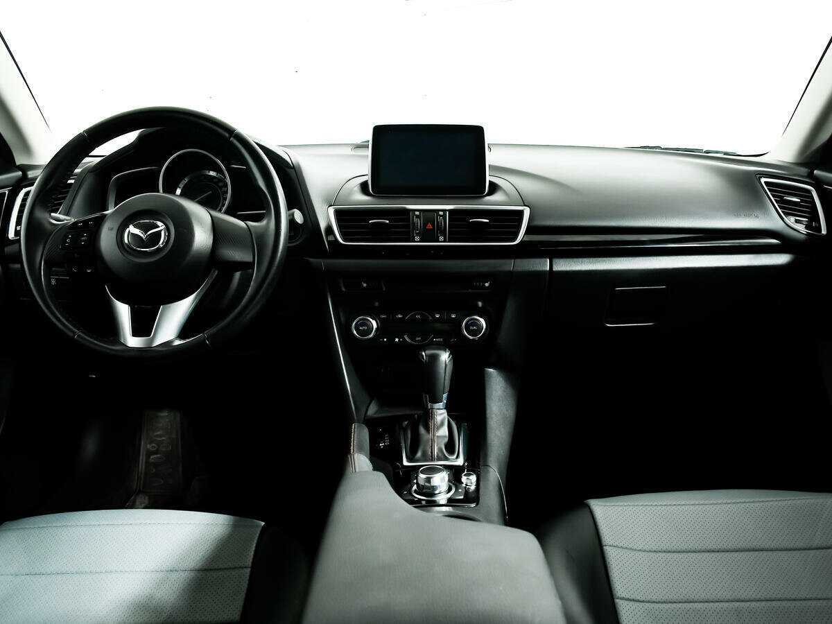 Mazda 3 с пробегом — 2014 год. Фото: #10