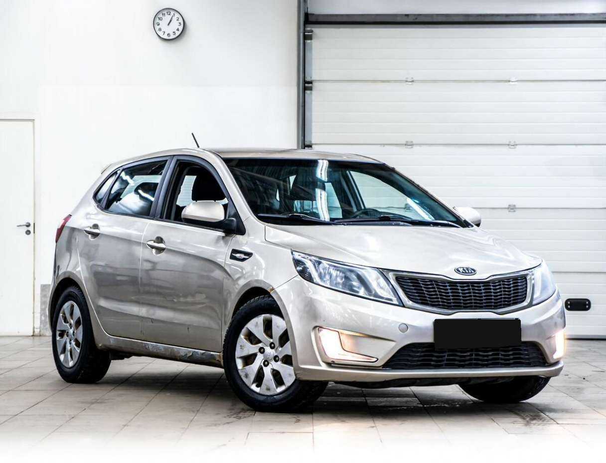 Kia Rio с пробегом — 2012 год. Фото: #1