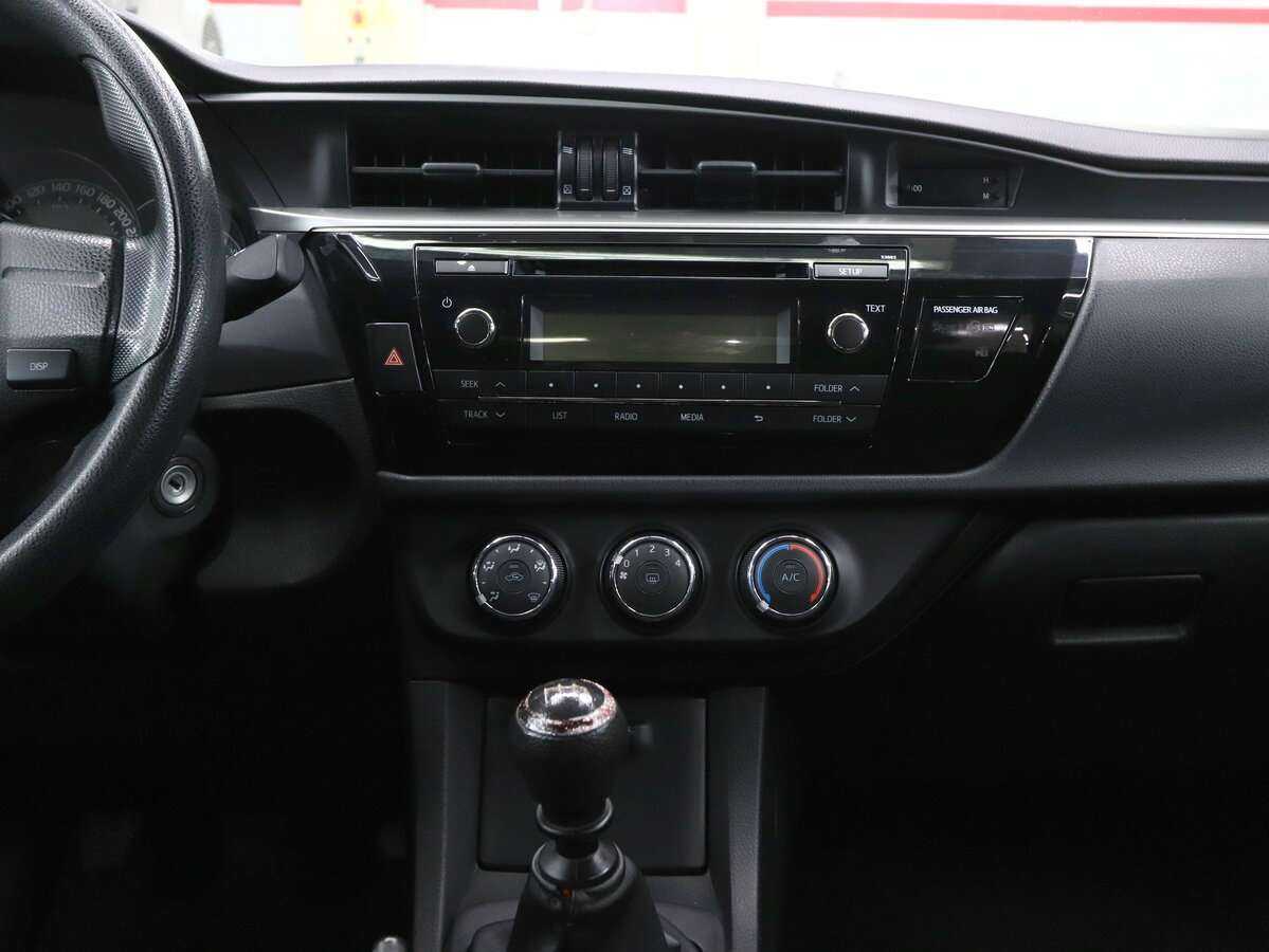 Toyota Corolla с пробегом — 2014 год. Фото: #16