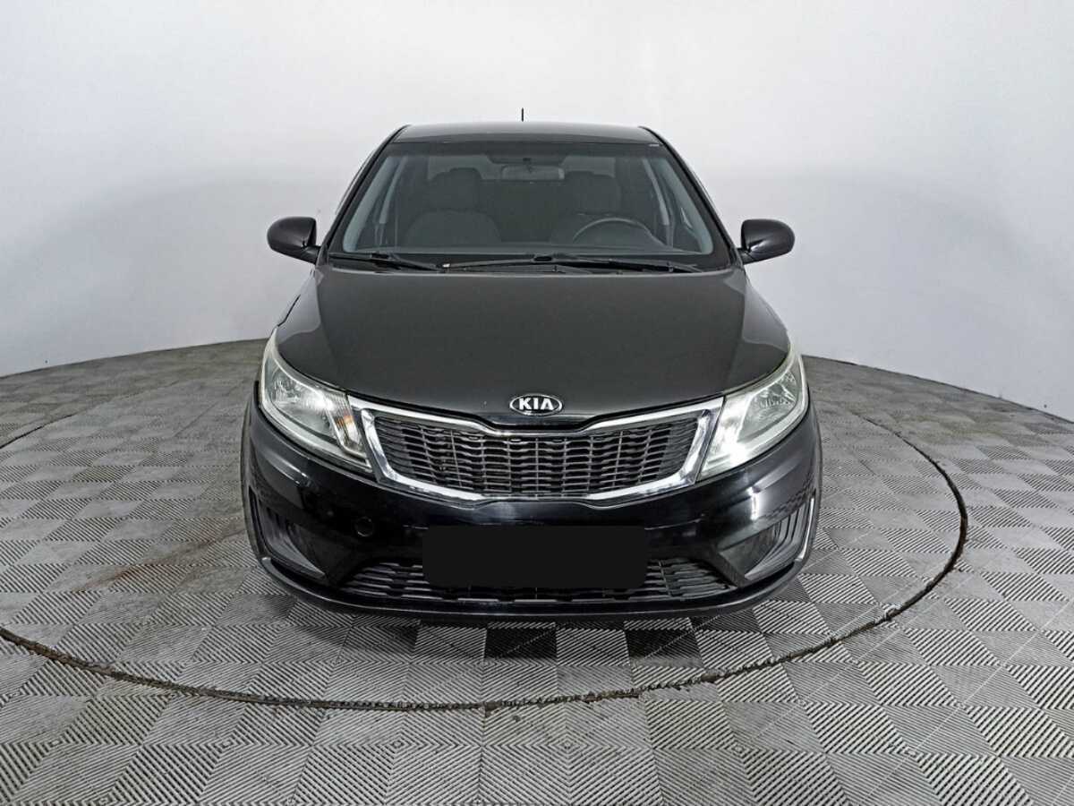 Kia Rio с пробегом — 2014 год. Фото: #1