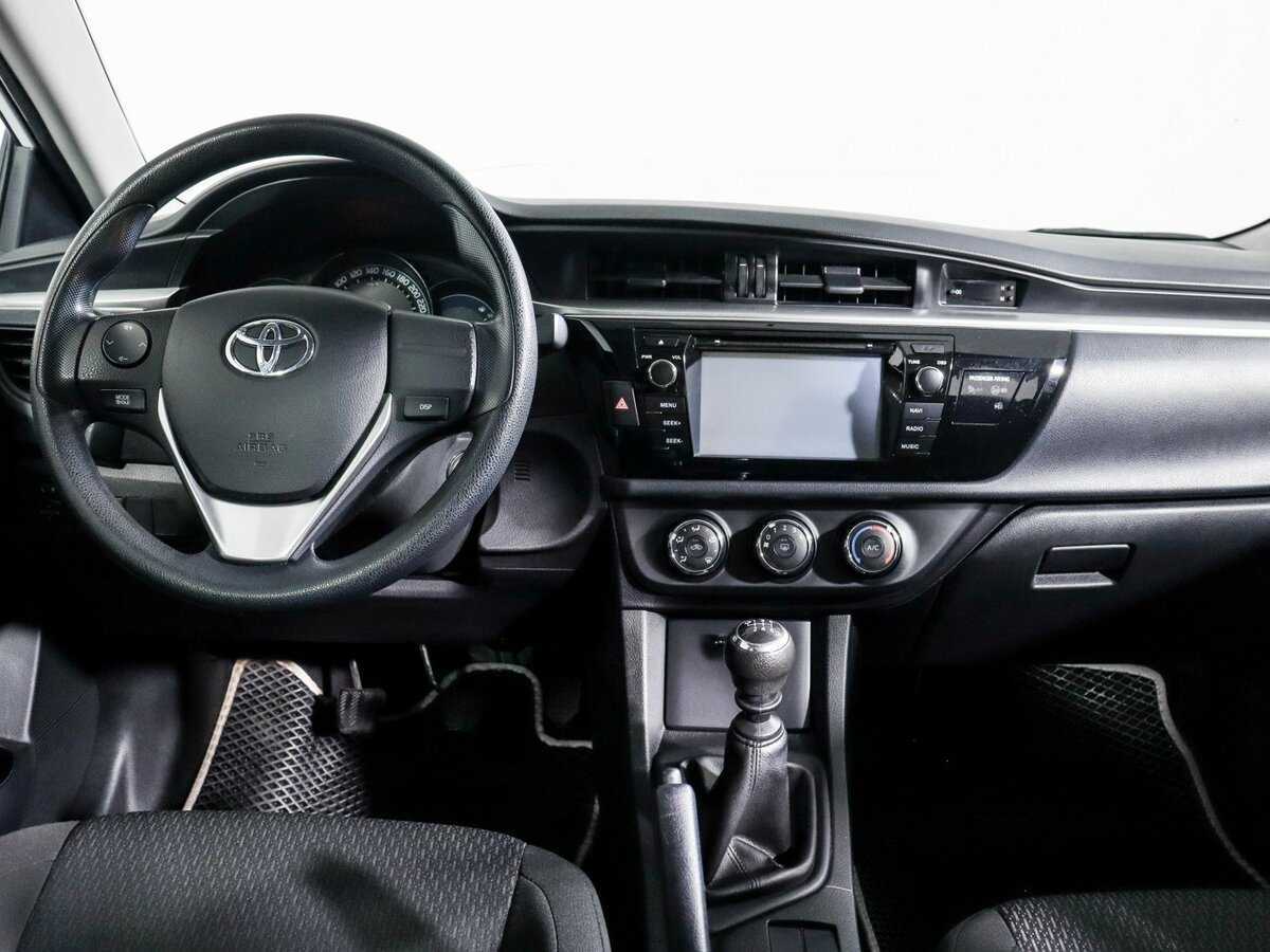 Toyota Corolla с пробегом — 2014 год. Фото: #11