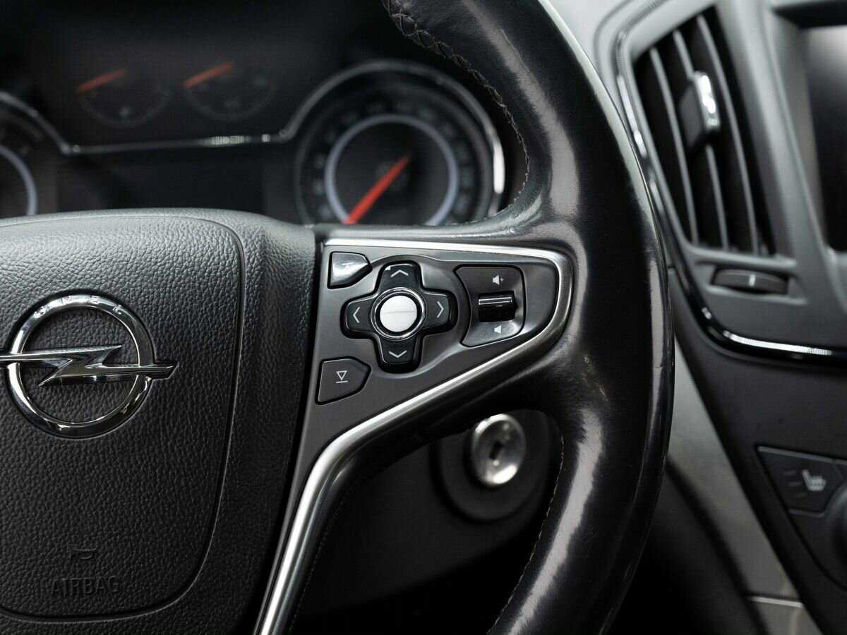 Opel Insignia с пробегом — 2014 год. Фото: #15
