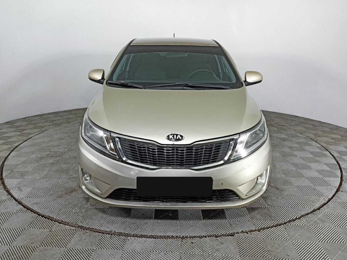 Kia Rio с пробегом — 2014 год. Фото: #1