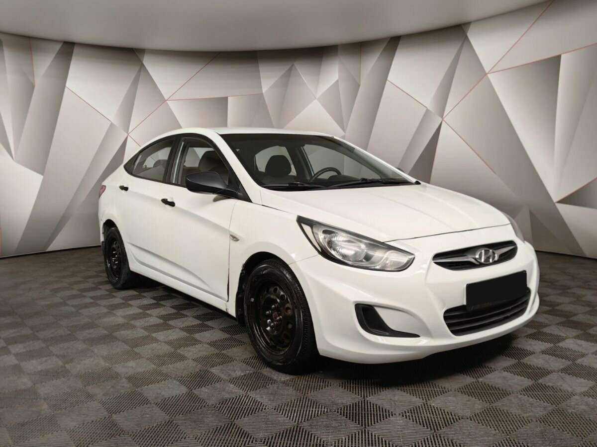 Hyundai Solaris с пробегом — 2013 год. Фото: #2