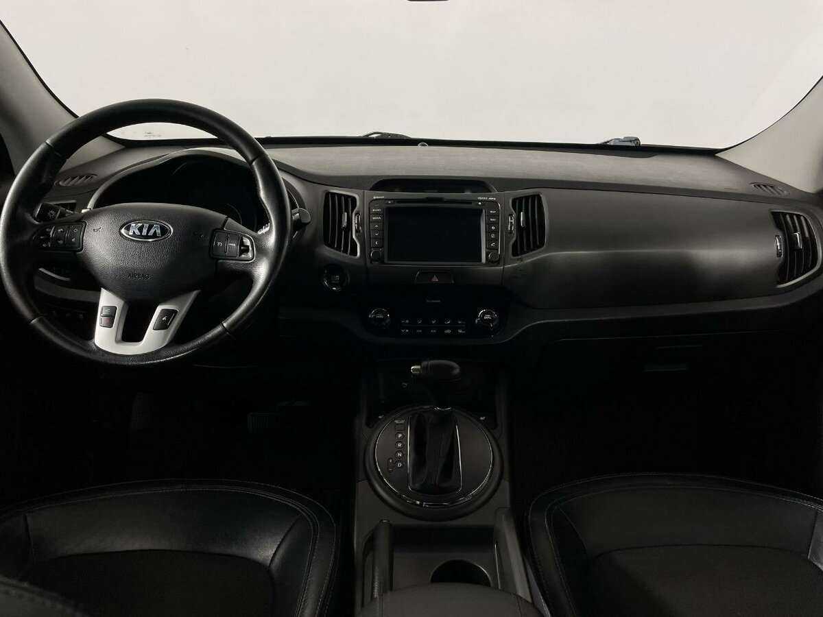 Kia Sportage с пробегом — 2013 год. Фото: #6