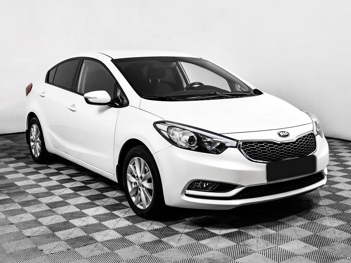 Kia Cerato с пробегом — 2013 год. Фото: #2