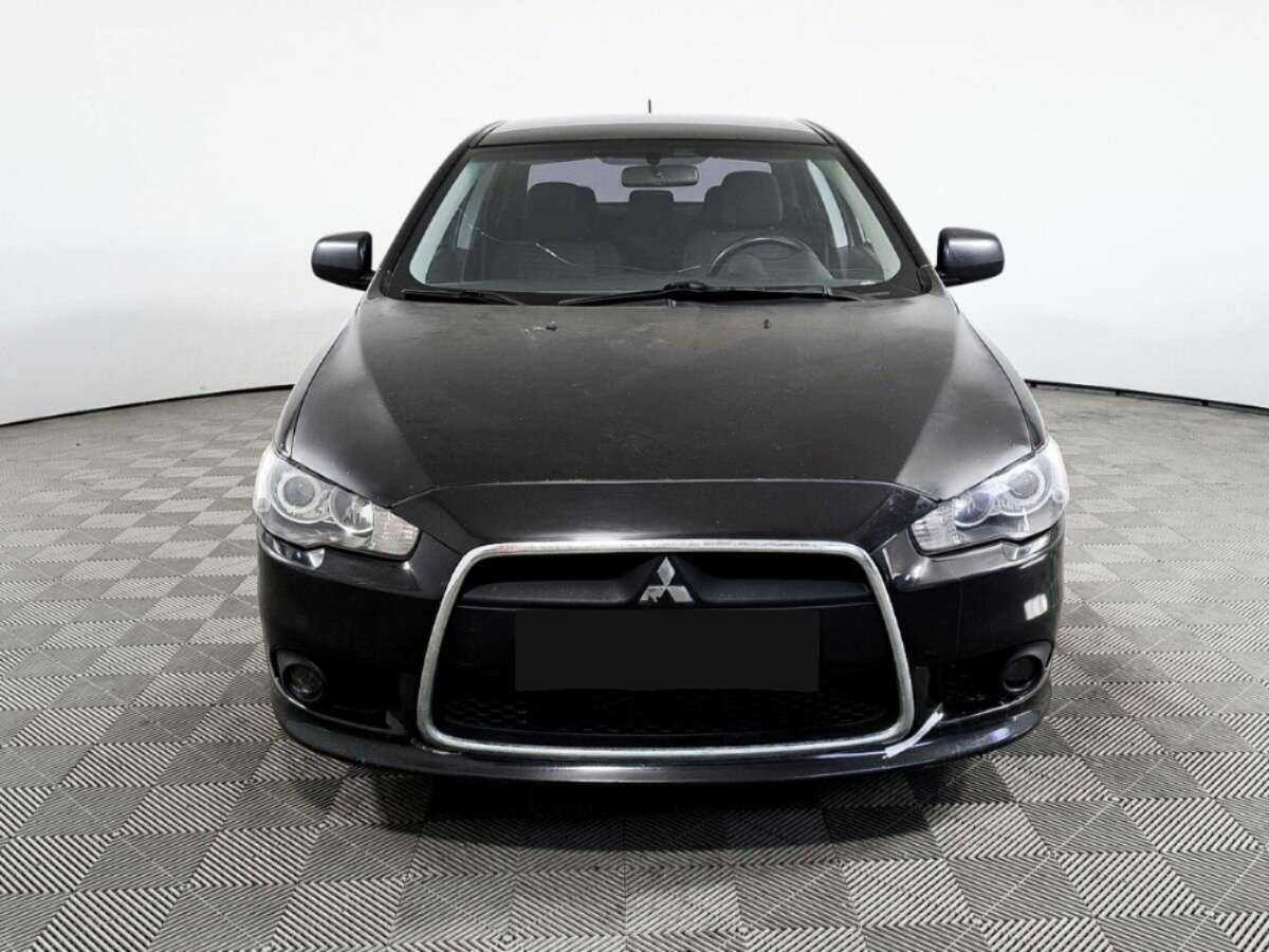 Mitsubishi Lancer с пробегом — 2012 год. Фото: #1