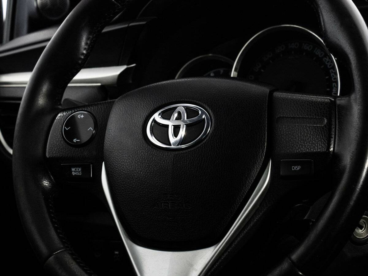 Toyota Corolla с пробегом — 2013 год. Фото: #10