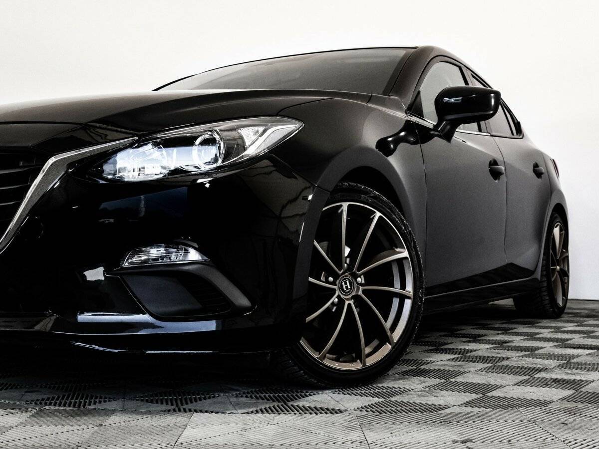 Mazda 3 с пробегом — 2013 год. Фото: #1