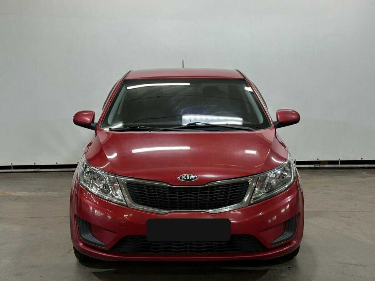 Kia Rio с пробегом — 2013 год. Фото: #1