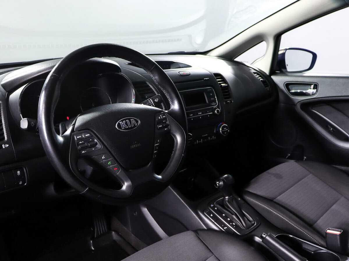 Kia Cerato с пробегом — 2015 год. Фото: #13