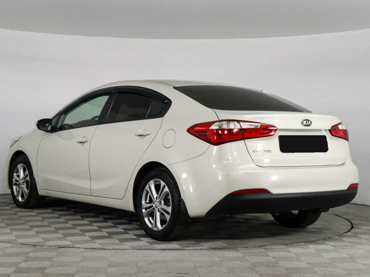 Kia Cerato с пробегом — 2013 год. Фото: #6