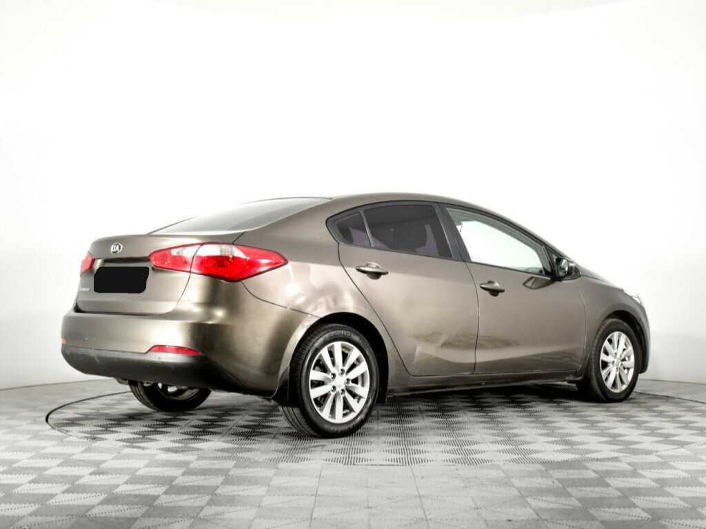 Kia Cerato с пробегом — 2015 год. Фото: #4