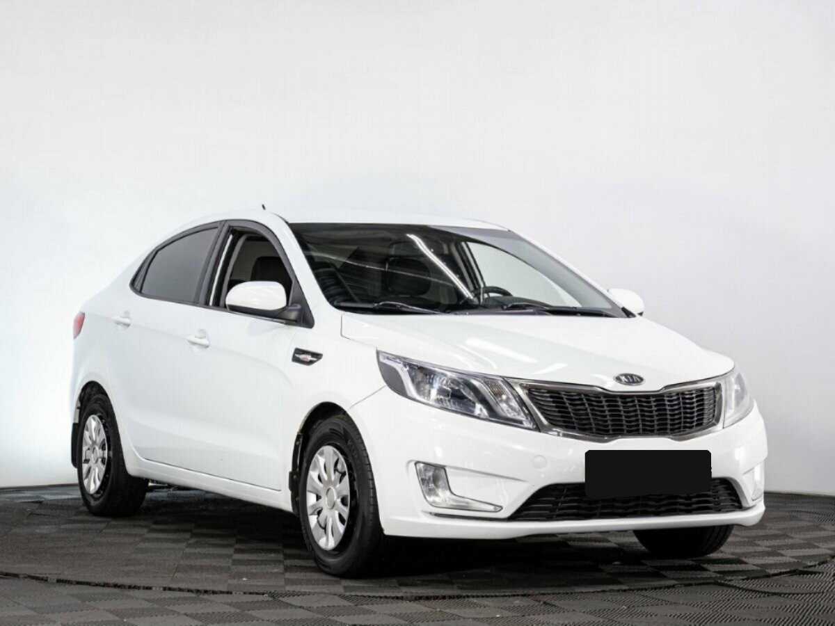 Kia Rio с пробегом — 2012 год. Фото: #2