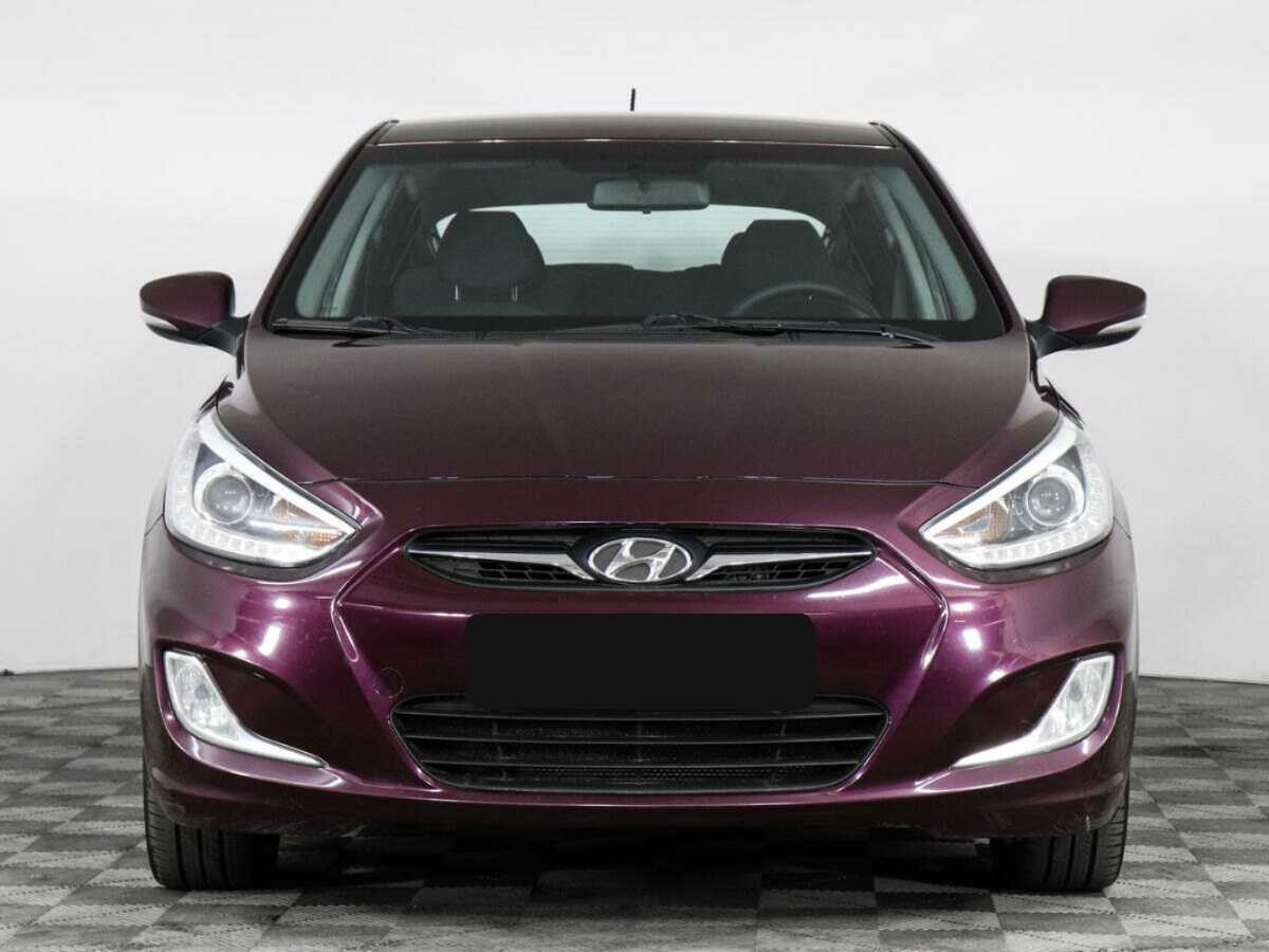 Hyundai Solaris с пробегом — 2014 год. Фото: #1