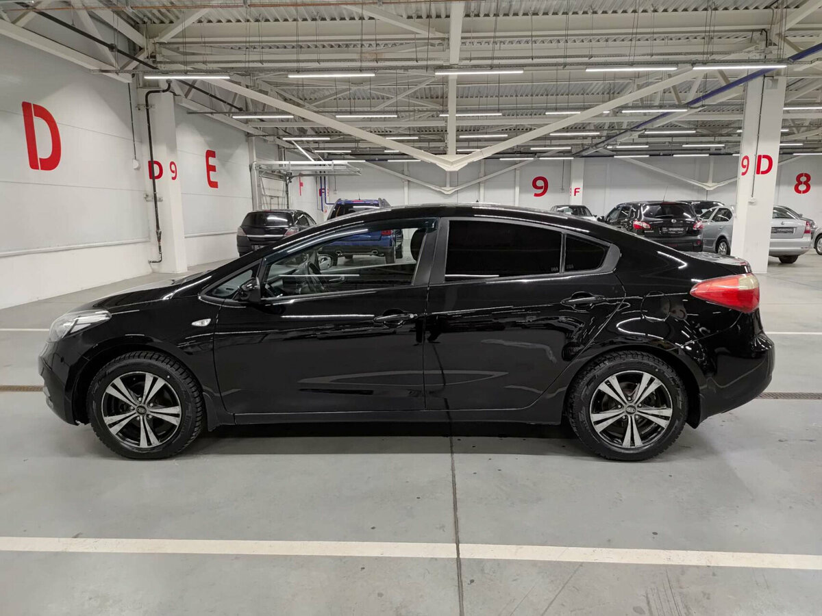 Kia Cerato с пробегом — 2013 год. Фото: #7