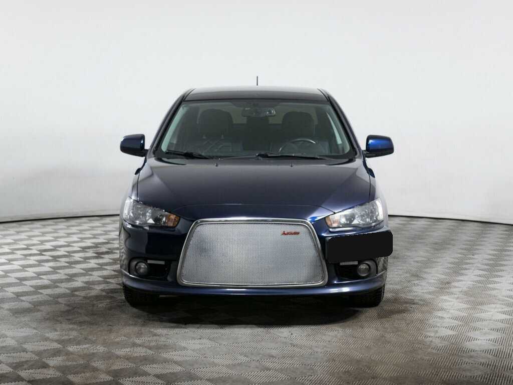 Mitsubishi Lancer с пробегом — 2014 год. Фото: #1