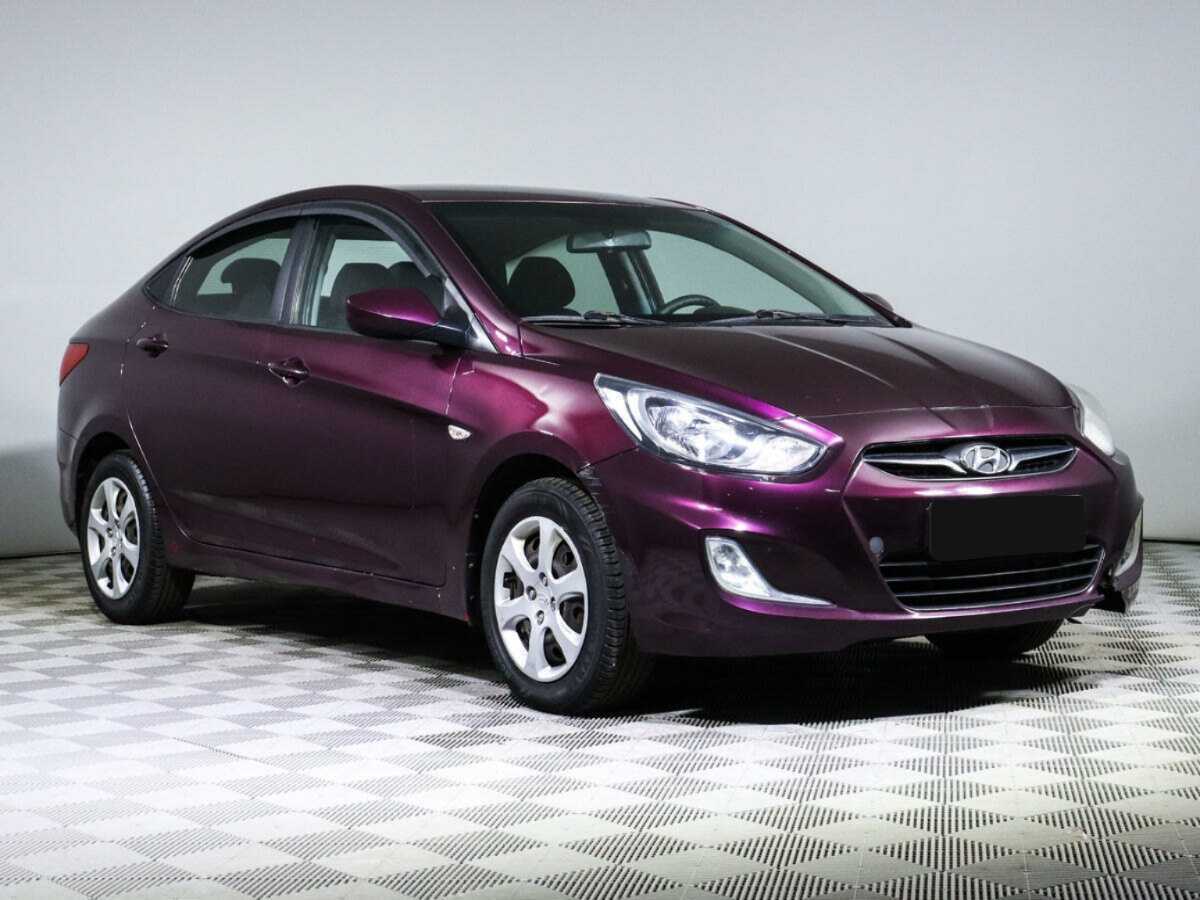 Hyundai Solaris с пробегом — 2012 год. Фото: #2