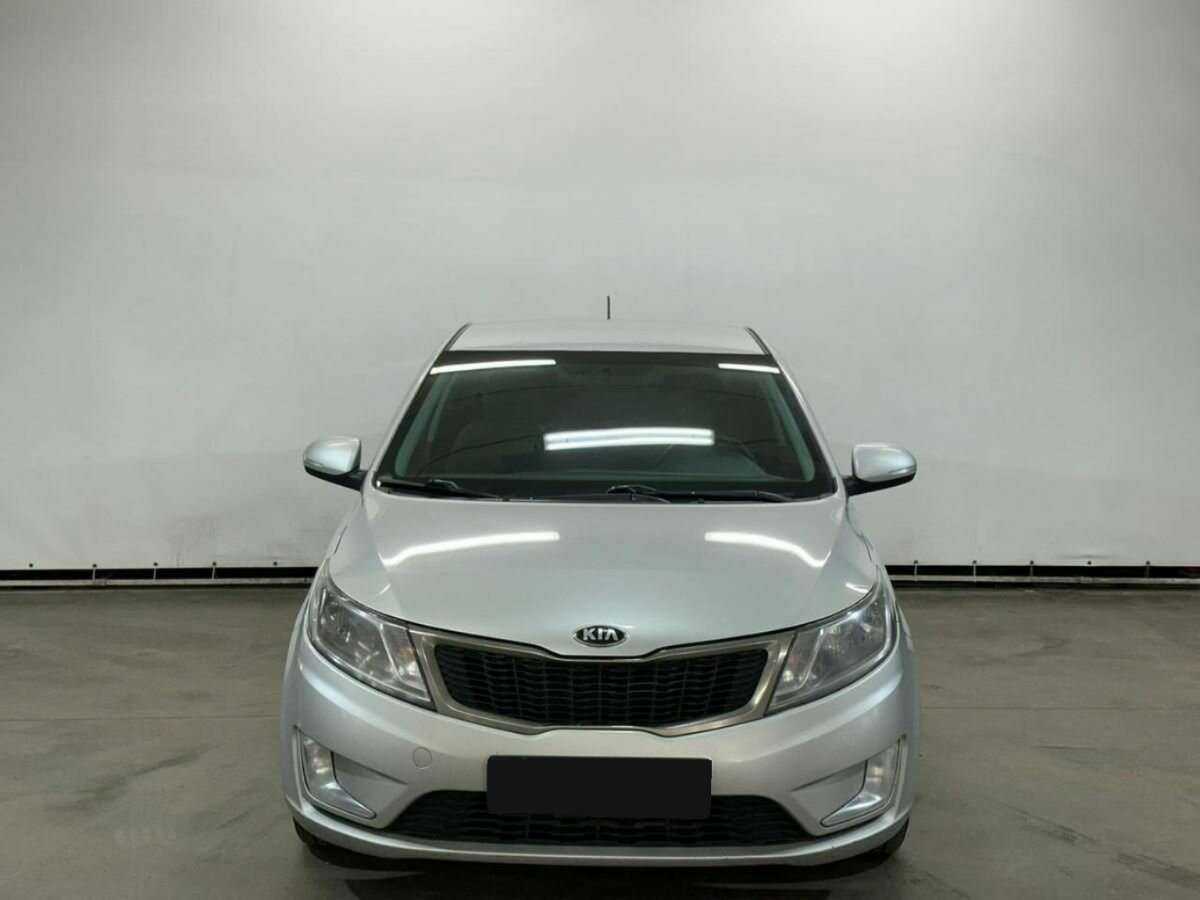 Kia Rio с пробегом — 2014 год. Фото: #1