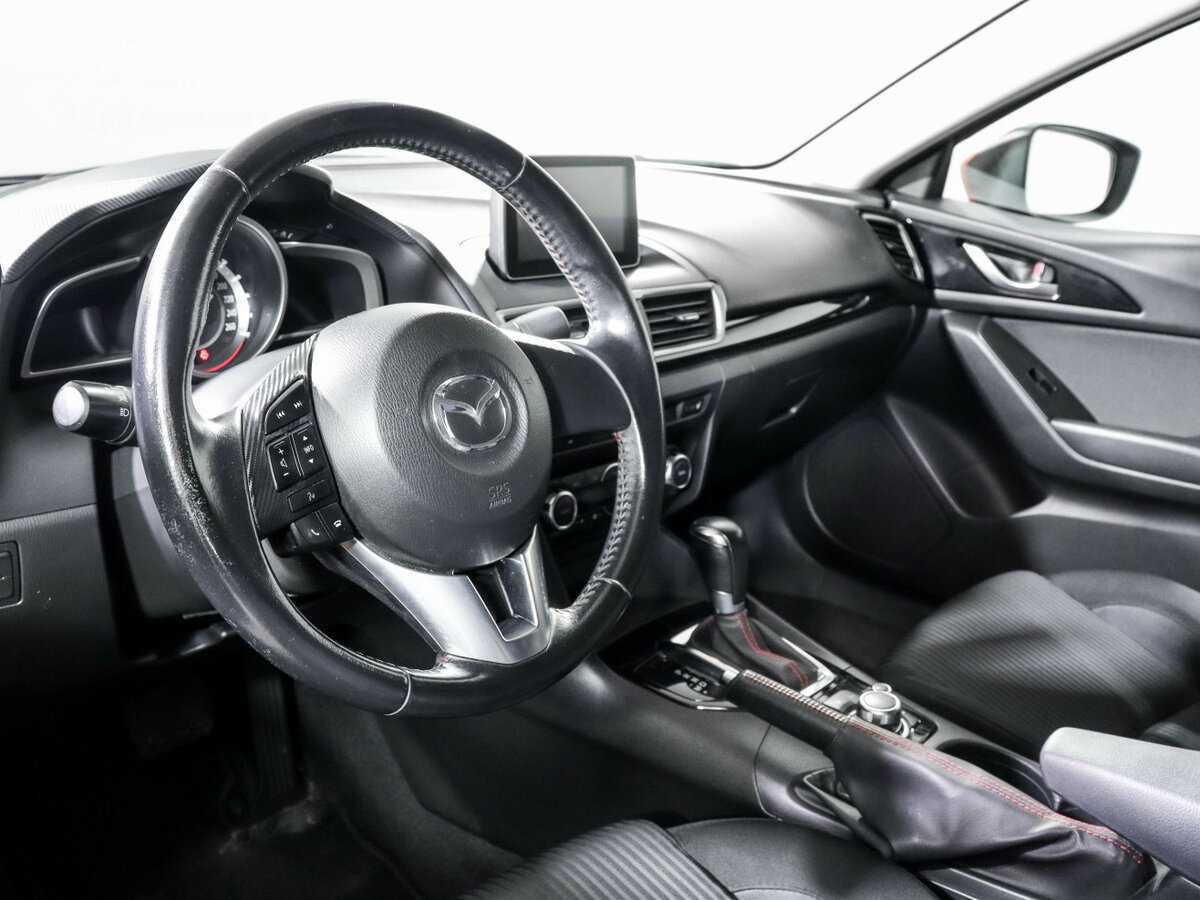 Mazda 3 с пробегом — 2014 год. Фото: #10