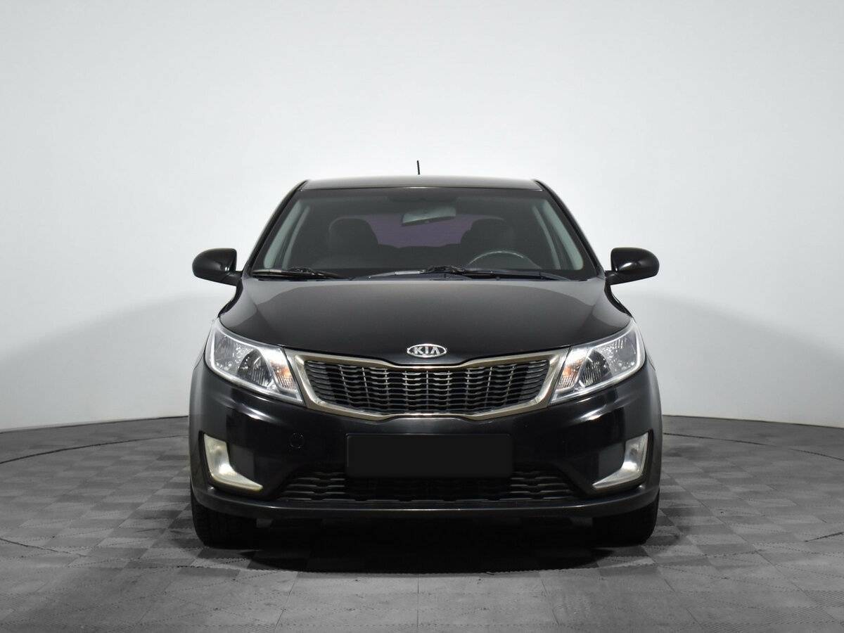 Kia Rio с пробегом — 2012 год. Фото: #1