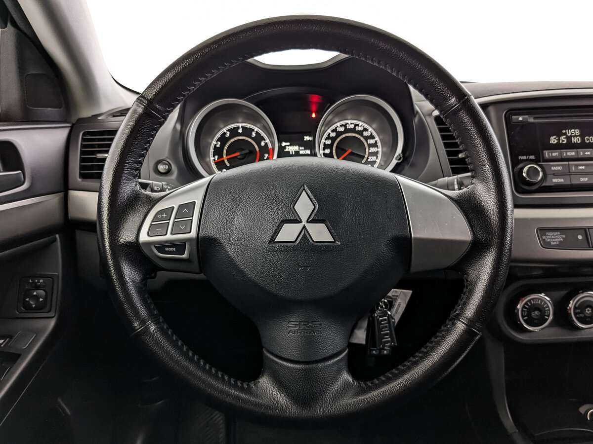 Mitsubishi Lancer с пробегом — 2015 год. Фото: #16