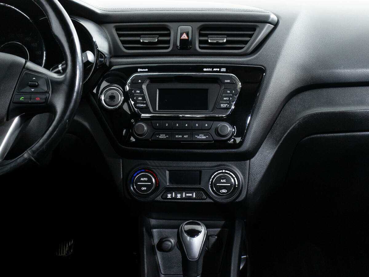 Kia Rio с пробегом — 2014 год. Фото: #13